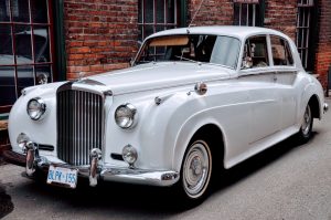 Rolls Royce with brick background