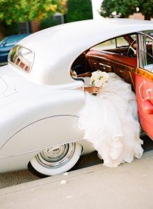 bride entering rolls royce